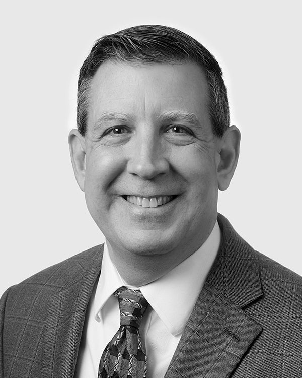 Mortgage Loan Officer Chris Fleser's black-and-white headshot