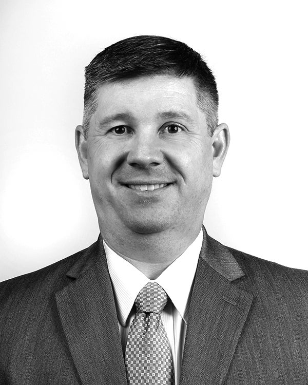 Mortgage professional and loan expert Trip Miller's black-and-white headshot