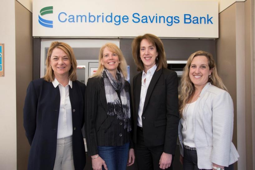 CSB Bank employees Ellen Poisson, Faith Pulis, Sallt Sacelle, and Jennifer Scobo posing for a photograph together