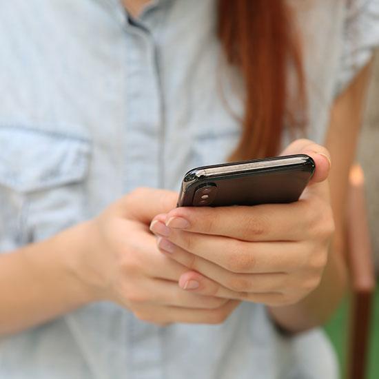 Female looking at cell phone