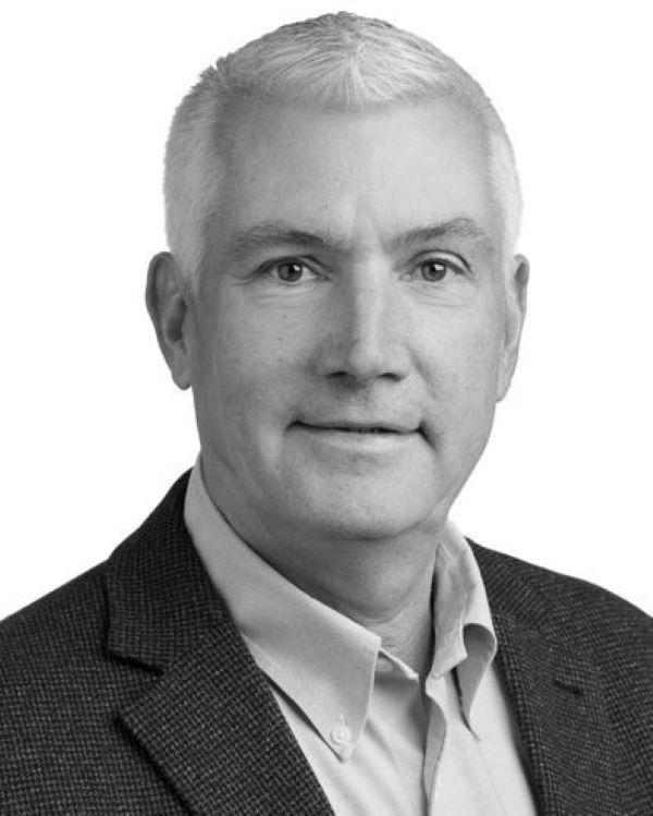 Black and white headshot of mortgage loan officer Tom Shewalter