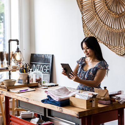 Business owner standing at desk